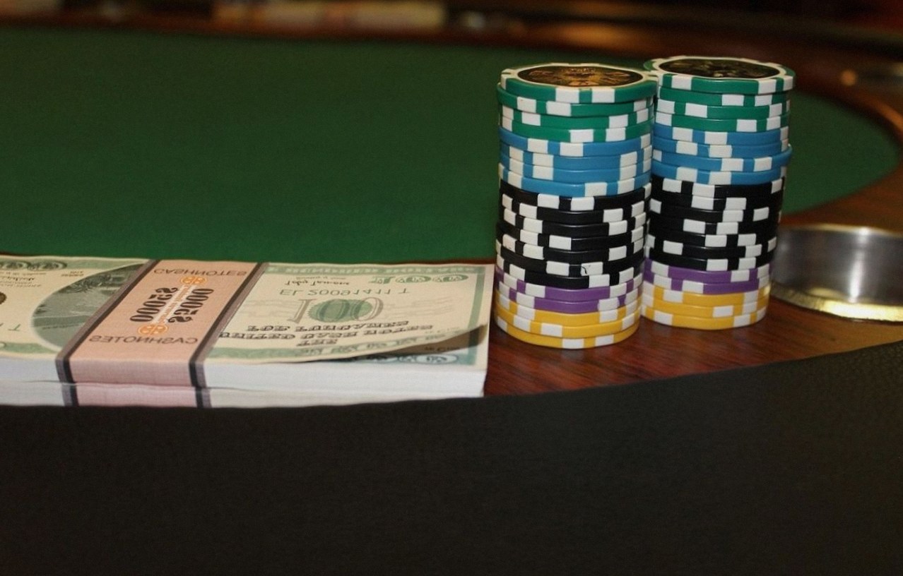A relaxed group gathering around a table for an entertainment-only game session