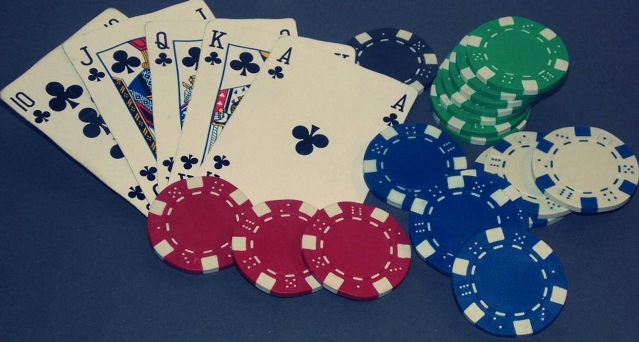 A group gathered around a game table during a shared evening